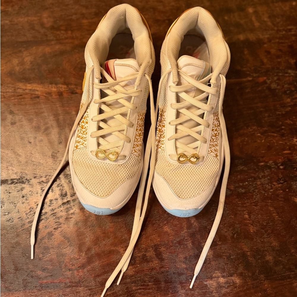 Nike JA Morant Stylish Cream Sneakers with Gold Accents